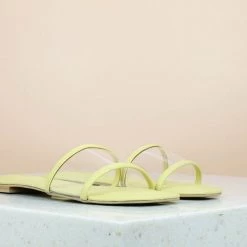 Inc.5 TRANSPARENT FLAT MULE-YELLOW