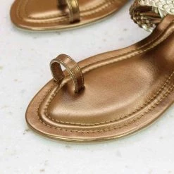 Inc.5 SALE FLAT WOVEN THONG - ANTIQUE GOLD